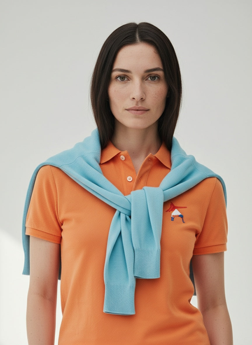 Close-up of the model wearing Nike dri-fit micro pique 2.0 polo- Orange