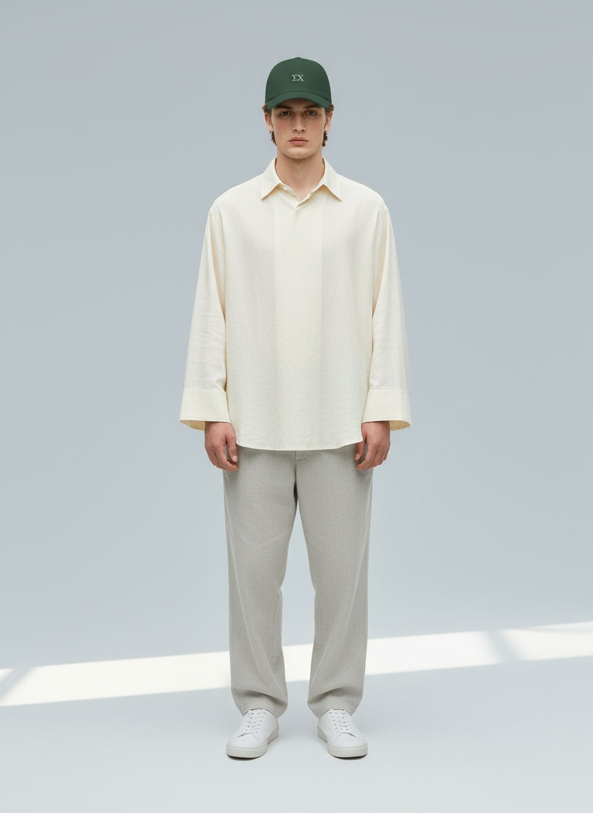 Full body view of the model wearing Sigma Chi hat