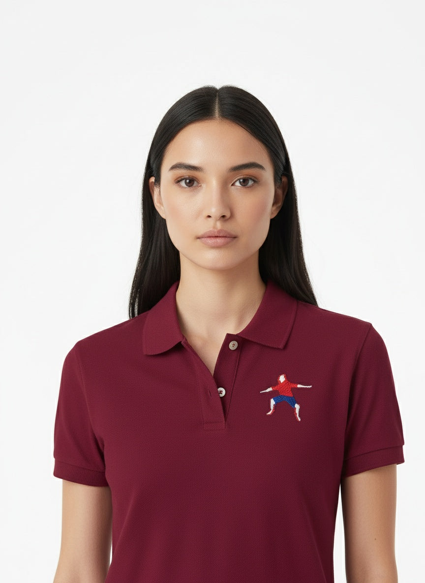 Close-up of the model wearing Adidas Performance Polo- Maroon white arms logo